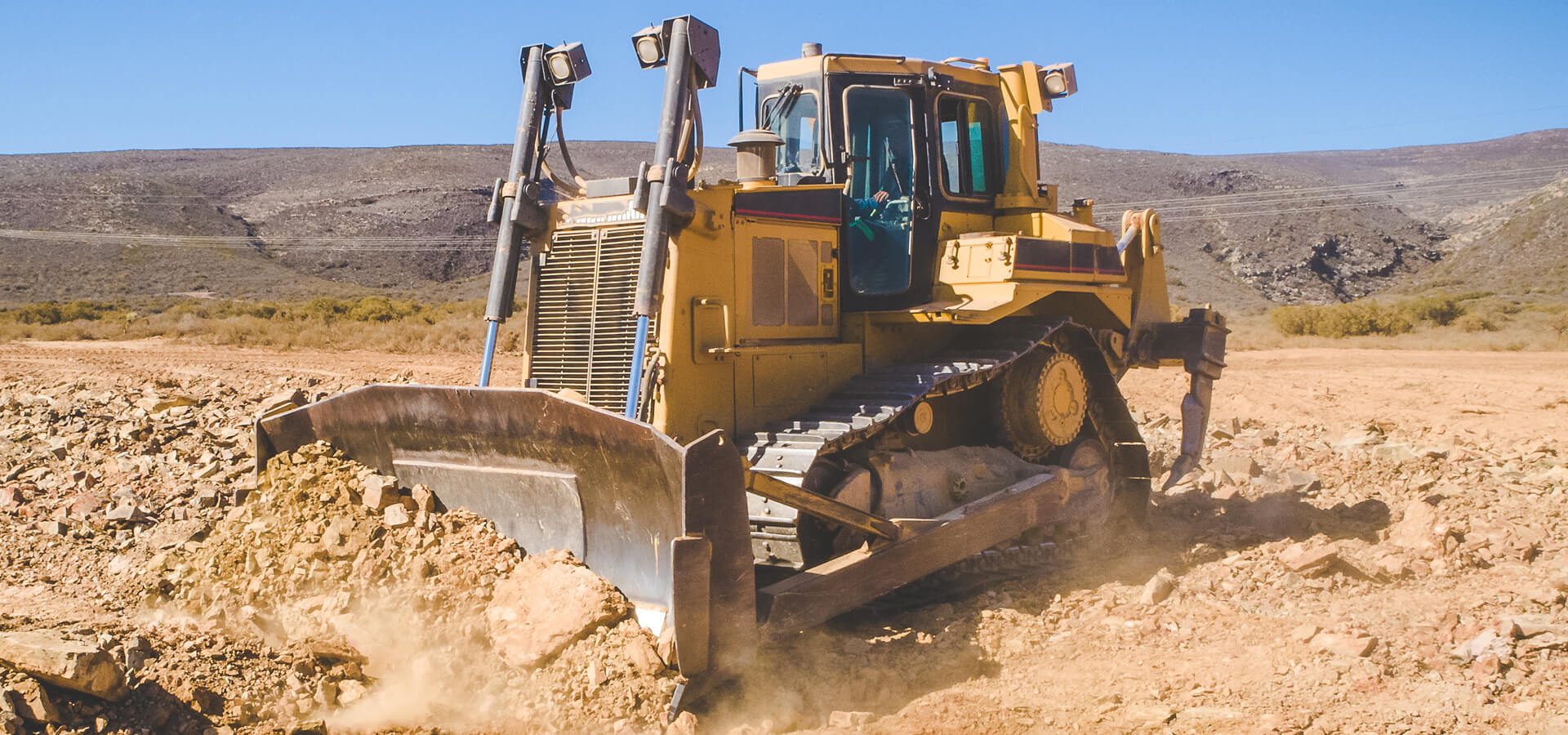 Aerial Image Of A Bulldozer Pushing And Ripping Ground On An Agr